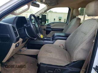 2015 Ford F-150 XLT z VIN 1FTEW1EF1FKE97936, wystawiony jako Copart lot #56297204 z przebiegiem 149 116 mil mil oraz Czysty tytuł • Clean title. Historia ofert i sprzedaży dostępna na DreamBid. Obrazek 7.