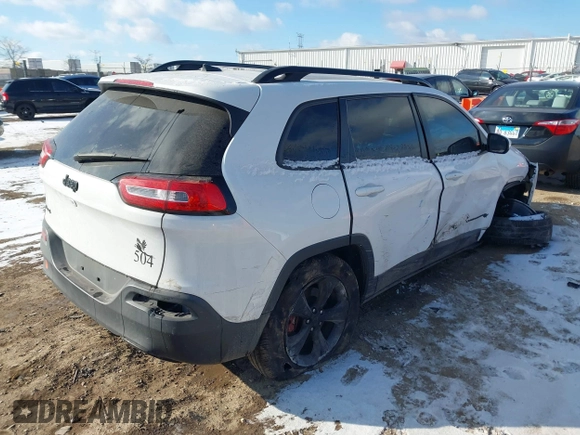 2015 Jeep Cherokee North with VIN 1C4PJMCS7FW792850, listed as a IAAI auction lot 41323432 with 102,642 mi miles. Bid and sale history available at carsss.com. Image 4.