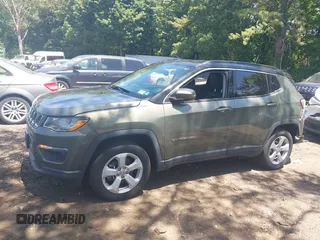 2018 Jeep Compass Latitude with VIN 3C4NJDBB5JT200840, listed as a IAAI auction lot 42557660 with 39,489 mi miles and . Bid and sale history available at DreamBid. Image 14.