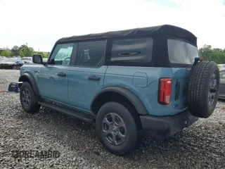 2021 Ford Bronco z VIN 1FMDE5BH0MLA96747, wystawiony jako Copart lot #57060985 z przebiegiem 37 048 mil mil oraz Szkoda całkowita • Salvage title. Historia ofert i sprzedaży dostępna na DreamBid. Obrazek 2.