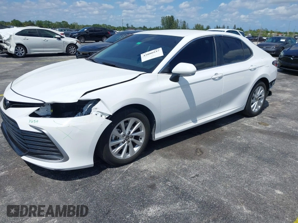 2024 Toyota Camry LE z VIN 4T1R11AK5RU881936, wystawiony jako IAAI lot #42080937 z przebiegiem 13 302 mil mil oraz . Historia ofert i sprzedaży dostępna na DreamBid. Obrazek 18.