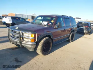 1996 Chevrolet Tahoe with VIN 1GNEK13R9TJ408499, listed as a IAAI auction lot 41308726 with 118,336 mi miles. Bid and sale history available at carsss.com. Image 2.