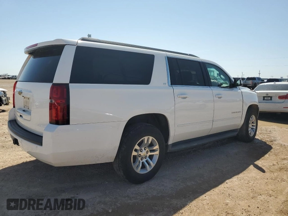 2015 Chevrolet Suburban LS with VIN 1GNSCHEC2FR295695, listed as a Copart auction lot 52395345 with 118,664 mi miles and Salvage title. Bid and sale history available at DreamBid. Image 3.