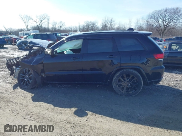 2019 Jeep Grand Cherokee Laredo E with VIN 1C4RJFAG6KC661777, listed as a IAAI auction lot 41762646 with 103,547 mi miles. Bid and sale history available at carsss.com. Image 14.