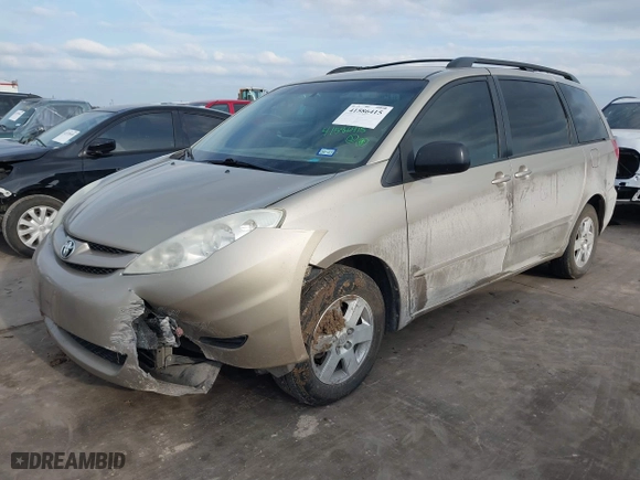 2010 Toyota Sienna CE with VIN 5TDKK4CC9AS311702, listed as a IAAI auction lot 41586415 with 206,453 mi miles. Bid and sale history available at carsss.com. Image 17.