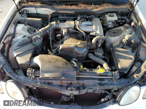 1998 Lexus GS 300 z VIN JT8BD68S1W0037717, wystawiony jako Copart lot #77238404 z przebiegiem 154 474 mil mil oraz Szkoda całkowita • Salvage title. Historia ofert i sprzedaży dostępna na DreamBid. Obrazek 12.