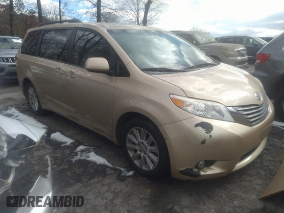 2011 Toyota Sienna XLE with VIN 5TDDK3DC3BS029476, listed as a IAAI auction lot 41393568 with 124,328 mi miles. Bid and sale history available at carsss.com. Image 1.
