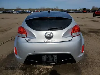 2013 Hyundai Veloster w/Black Int с VIN KMHTC6AD4DU139261, выставлен на аукционе Copart как лот 56175095 с пробегом 148 483 миль миль и Чистый • Clean title. История ставок и продаж доступна на DreamBid. Изображение 6.