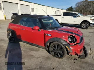 2013 MINI Convertible S with VIN WMWZP3C50DT550554, listed as a Copart auction lot 88415495 with 95,295 mi miles and Salvage title. Bid and sale history available at DreamBid. Image 4.