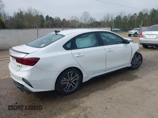 2023 Kia Forte GT-Line z VIN 3KPF54AD7PE683899, wystawiony jako IAAI lot #41902601 z przebiegiem 13 859 mil mil oraz . Historia ofert i sprzedaży dostępna na DreamBid. Obrazek 4.