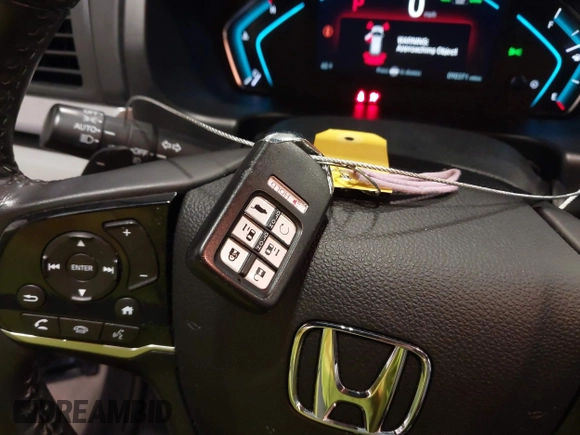 2018 Honda Odyssey Touring with VIN 5FNRL6H84JB041309, listed as a IAAI auction lot 42272247 with 90,371 mi miles and . Bid and sale history available at DreamBid. Image 11.