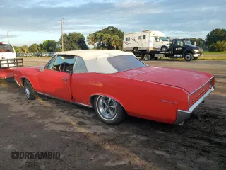 1966 Pontiac GTO z VIN 235676P261739, wystawiony jako Copart lot #75633424 z przebiegiem 23 103 mil mil oraz Szkoda całkowita • Salvage title. Historia ofert i sprzedaży dostępna na DreamBid. Obrazek 2.