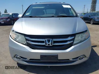 2014 Honda Odyssey Touring with VIN 5FNRL5H91EB068427, listed as a IAAI auction lot 42163315 with 184,134 mi miles and . Bid and sale history available at DreamBid. Image 13.