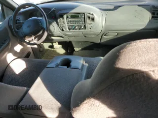 1999 Ford F-150 XL с VIN 1FTRX08L3XKB18916, выставлен на аукционе Copart как лот 81892064 с пробегом 175 280 миль миль и Списание • Salvage title. История ставок и продаж доступна на DreamBid. Изображение 8.