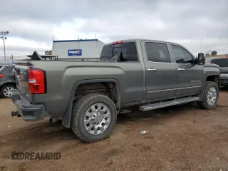 2018 GMC Sierra 2500HD Denali z VIN 1GT12UEY4JF128650, wystawiony jako Copart lot #51102895 z przebiegiem 131 010 mil mil oraz Szkoda całkowita • Salvage title. Historia ofert i sprzedaży dostępna na DreamBid. Obrazek 3.