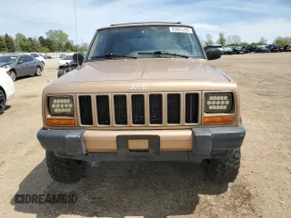 2000 Jeep Cherokee Classic с VIN 1J4FF58S7YL134763, выставлен на аукционе Copart как лот 55957205 с пробегом 229 160 миль миль и Списание • Salvage title. История ставок и продаж доступна на DreamBid. Изображение 5.