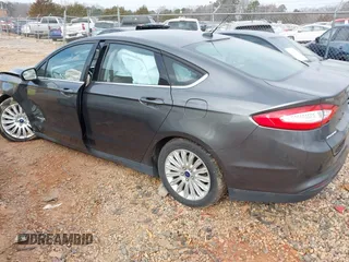 2015 Ford Fusion S Hybrid with VIN 3FA6P0UU7FR167229, listed as a IAAI auction lot 41684934 with 135,317 mi miles. Bid and sale history available at carsss.com. Image 3.
