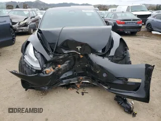 2021 Tesla Model 3 Standard Range Plus with VIN 5YJ3E1EA6MF877752, listed as a Copart auction lot 44776425 with Not Provided miles and Salvage Title. Bid and sale history available at DreamBid. Image 5.