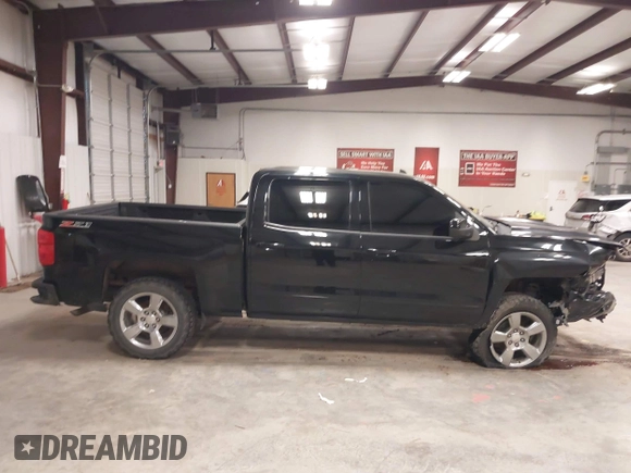 2017 Chevrolet Silverado 1500 LT with VIN 3GCUKREC6HG501307, listed as a IAAI auction lot 41611899 with 133,863 mi miles and . Bid and sale history available at DreamBid. Image 14.