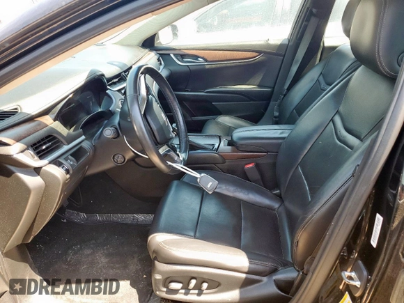2019 Cadillac XTS Luxury z VIN 2G61M5S3XK9133339, wystawiony jako Copart lot #52651365 z przebiegiem 124 041 mil mil oraz Szkoda całkowita • Salvage title. Historia ofert i sprzedaży dostępna na DreamBid. Obrazek 7.