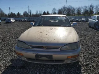 1996 Toyota Camry DX with VIN JT2BG12K1T0395294, listed as a Copart auction lot 47295405 with 259,898 mi miles and Salvage Title. Bid and sale history available at carsss.com. Image 5.