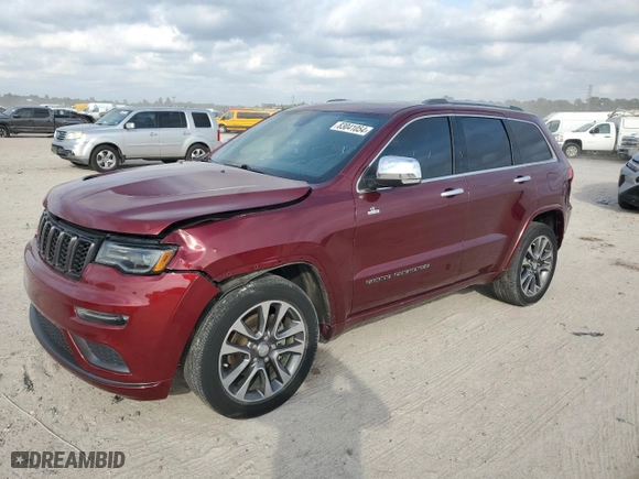 2017 Jeep Grand Cherokee Overland with VIN 1C4RJECG3HC868255, listed as a Copart auction lot 83041054 with 121,604 mi miles and Salvage Title. Bid and sale history available at carsss.com. Image 1.