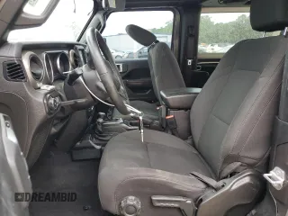 2019 Jeep Wrangler Sport S с VIN 1C4GJXAG1KW579094, выставлен на аукционе Copart как лот 55410525 с пробегом 53 915 миль миль и Списание • Salvage title. История ставок и продаж доступна на DreamBid. Изображение 7.
