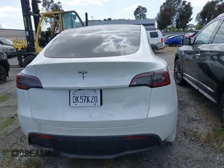 2024 Tesla Model Y with VIN 7SAYGDED2RF207783, listed as a IAAI auction lot 41758143 with Not Provided miles and . Bid and sale history available at DreamBid. Image 16.