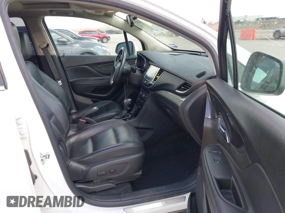 2019 Buick Encore Essence with VIN KL4CJGSM6KB892999, listed as a IAAI auction lot 41876481 with 98,866 mi miles. Bid and sale history available at carsss.com. Image 5.