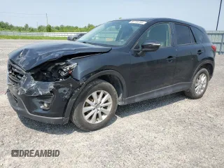 2016 Mazda CX-5 Touring z VIN JM3KE4CY4G0889616, wystawiony jako Copart lot #58759705 z przebiegiem 147 433 mil mil oraz Szkoda całkowita • Salvage title. Historia ofert i sprzedaży dostępna na DreamBid. Obrazek 1.