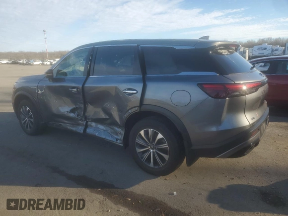 2024 Infiniti QX60 Pure with VIN 5N1DL1ESXRC342409, listed as a Copart auction lot 86615684 with 12,602 mi miles and Salvage title. Bid and sale history available at DreamBid. Image 2.