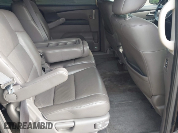 2011 Honda Odyssey EX-L with VIN 5FNRL5H68BB071178, listed as a IAAI auction lot 42286324 with 213,847 mi miles and . Bid and sale history available at DreamBid. Image 8.