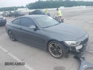 2014 BMW 4 Series 428i with VIN WBA3N7C52EK221929, listed as a IAAI auction lot 42530110 with 126,828 mi miles and . Bid and sale history available at DreamBid. Image 1.