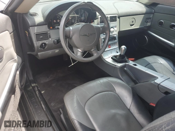 2004 Chrysler Crossfire z VIN 1C3AN69L84X014803, wystawiony jako Copart lot #56139015 z przebiegiem 102 523 mil mil oraz Szkoda całkowita • Salvage title. Historia ofert i sprzedaży dostępna na DreamBid. Obrazek 8.