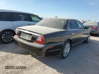 2008 Jaguar XJ with VIN SAJWA71B18SH25255, listed as a Copart auction lot 74781714 with 31,233 mi miles and Salvage Title. Bid and sale history available at carsss.com. Image 3.