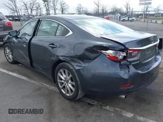 2014 Mazda 6 i Sport with VIN JM1GJ1U51E1111018, listed as a IAAI auction lot 41875461 with 253,755 mi miles and . Bid and sale history available at DreamBid. Image 3.