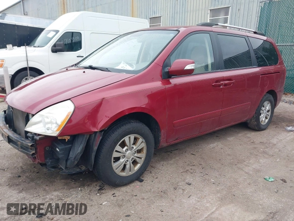 2012 Kia Sedona LX with VIN KNDMG4C75C6422392, listed as a IAAI auction lot 41235462 with 211,653 mi miles. Bid and sale history available at carsss.com. Image 2.