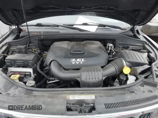 2013 Jeep Grand Cherokee Overland with VIN 1C4RJFCG1DC593890, listed as a IAAI auction lot 41264434 with 204,324 mi miles. Bid and sale history available at carsss.com. Image 10.