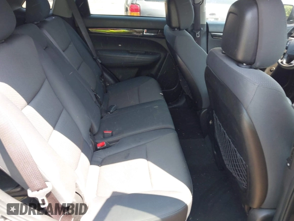 2013 Kia Sorento LX with VIN 5XYKT3A64DG363258, listed as a IAAI auction lot 42490986 with 215,694 mi miles and . Bid and sale history available at DreamBid. Image 8.