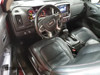 2015 GMC Canyon 4WD SLE with VIN 1GTH6BE39F1203164, listed as a Copart auction lot 51328885 with 107,171 mi miles and Salvage Title. Bid and sale history available at carsss.com. Image 8.