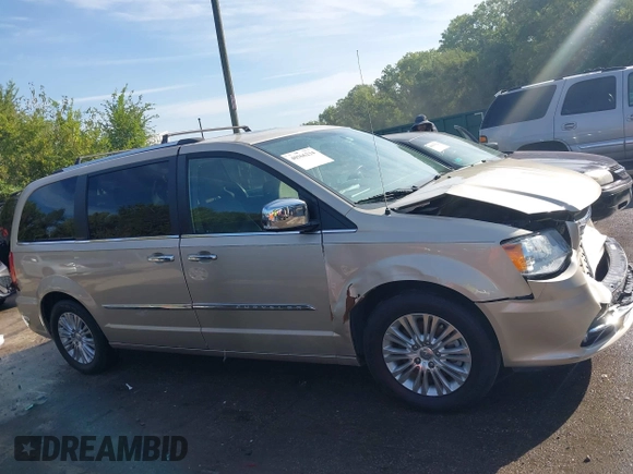 2015 Chrysler Town & Country Limited Platinum with VIN 2C4RC1GGXFR619209, listed as a IAAI auction lot 40366234 with 163,649 mi miles. Bid and sale history available at carsss.com. Image 14.