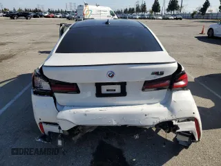 2021 BMW M5 z VIN WBS83CH00MCF66384, wystawiony jako Copart lot #55324995 z przebiegiem Nie podano mil oraz Szkody całkowita. Historia ofert i sprzedaży dostępna na DreamBid. Obrazek 6.