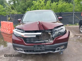 2019 Honda Ridgeline RTL-E with VIN 5FPYK3F78KB004781, listed as a IAAI auction lot 42425646 with 147,695 mi miles and . Bid and sale history available at DreamBid. Image 12.