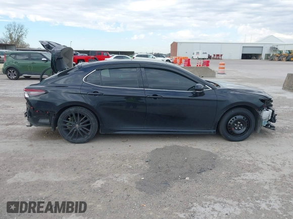 2022 Toyota Camry XSE z VIN 4T1K61AK2NU700840, wystawiony jako IAAI lot #41352884 z przebiegiem 98 634 mil mil oraz . Historia ofert i sprzedaży dostępna na DreamBid. Obrazek 14.