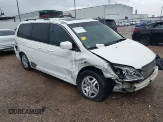 2007 Honda Odyssey EX-L z VIN 5FNRL38737B072789, wystawiony jako IAAI lot #41203148 z przebiegiem 156 828 mil mil oraz . Historia ofert i sprzedaży dostępna na DreamBid. Obrazek 1.