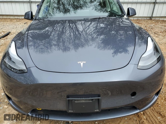 2023 Tesla Model Y Long Range z VIN 7SAYGDEE5PA164270, wystawiony jako Copart lot #50260835 z przebiegiem 17 340 mil mil oraz Szkoda całkowita • Salvage title. Historia ofert i sprzedaży dostępna na DreamBid. Obrazek 13.