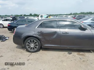 2014 Chrysler 300 S with VIN 2C3CCAGG5EH201509, listed as a IAAI auction lot 42292680 with 162,674 mi miles and . Bid and sale history available at DreamBid. Image 6.