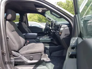 2023 Ford F-150 XL with VIN 1FTFW1E54PFC37083, listed as a IAAI auction lot 42247096 with 28,344 mi miles and . Bid and sale history available at DreamBid. Image 5.