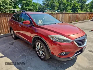 2014 Mazda CX-9 Grand Touring с VIN JM3TB2DA7E0441838, выставлен на аукционе Copart как лот 66305865 с пробегом 125 585 миль миль и Чистый • Clean title. История ставок и продаж доступна на DreamBid. Изображение 1.