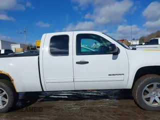 2012 GMC Sierra 1500 SLE z VIN 1GTR2VE75CZ218990, wystawiony jako IAAI lot #41565334 z przebiegiem 189 735 mil mil oraz . Historia ofert i sprzedaży dostępna na DreamBid. Obrazek 13.